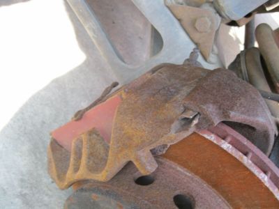 Ford F1TZ-2V120-ARM Caliper Assembly - Brake - Less Pads, Passenger Side